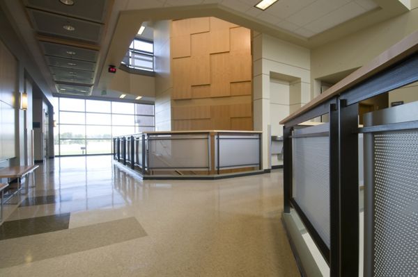 Close up view of McNICHOLS Perforated Metal applied as railing infill panels in a college building located in Spokane, WA