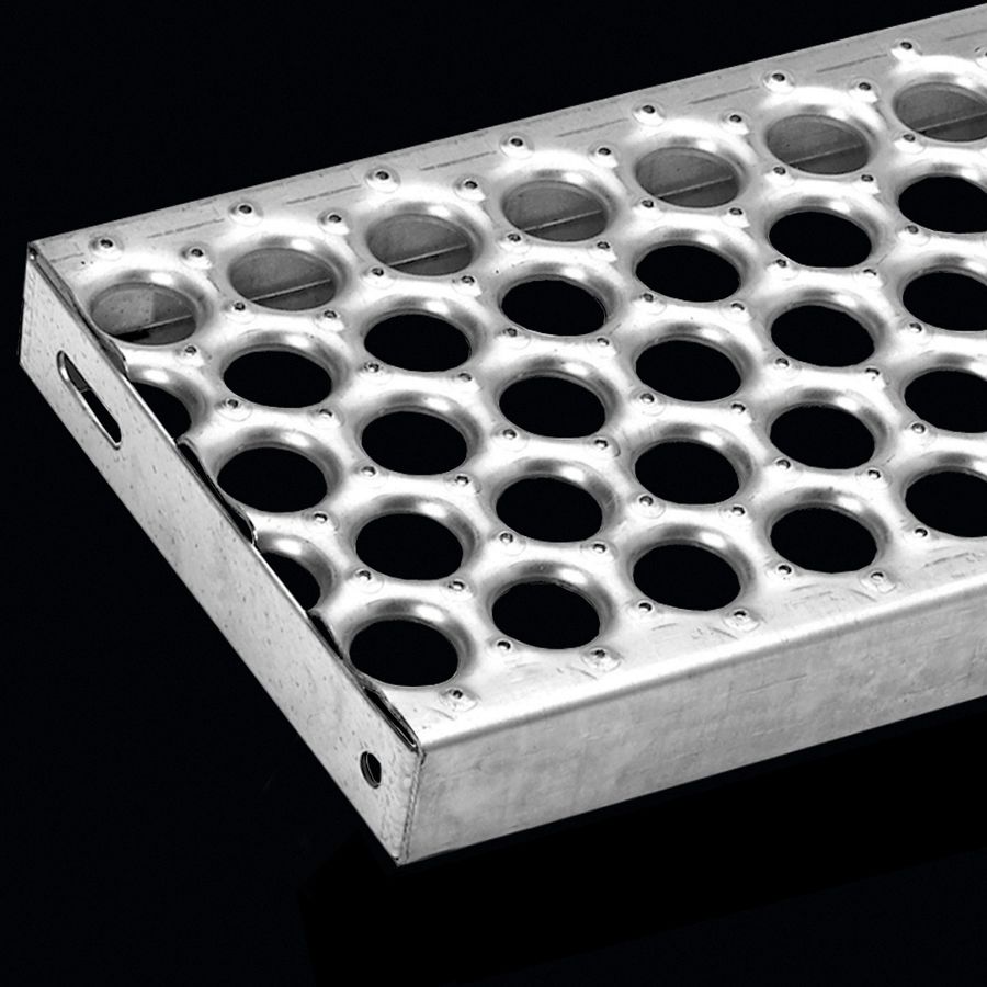 McNICHOLS® Stair Treads Plank Grating, Plank Stair Tread, PERF-O GRIP®, Galvanized Steel, ASTM A-924, 13 Gauge (.0934" Thick), 5-Hole (10" Width), 1-1/2" Channel Depth, Slip-Resistant Surface, No Nosing, CP-PG-1015 Plank Grating Stair Tread Carrier Plates Attached, 35% Open Area McNICHOLS® Stair Treads Plank Grating, Plank Stair Tread, PERF-O GRIP®, Galvanized Steel, ASTM A-924, 13 Gauge (.0934" Thick), 5-Hole (10" Width), 1-1/2" Channel Depth, Slip-Resistant Surface, No Nosing, CP-PG-1015 Plank Grating Stair Tread Carrier Plates Attached, 35% Open Area