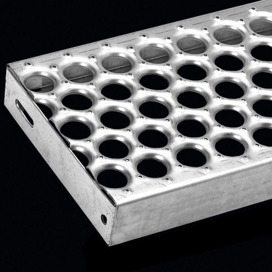McNICHOLS® Stair Treads Plank Grating, Plank, Stair Tread, PERF-O GRIP®, Galvanized Steel, ASTM A-924, 13 Gauge (.0934" Thick), 5-Hole (10" Width), 2" Channel Depth, Slip-Resistant Surface, No Nosing, CP-PG-1020 Plank Grating Stair Tread Carrier Plates Attached, 35% Open Area McNICHOLS® Stair Treads Plank Grating, Plank, Stair Tread, PERF-O GRIP®, Galvanized Steel, ASTM A-924, 13 Gauge (.0934" Thick), 5-Hole (10" Width), 2" Channel Depth, Slip-Resistant Surface, No Nosing, CP-PG-1020 Plank Grating Stair Tread Carrier Plates Attached, 35% Open Area
